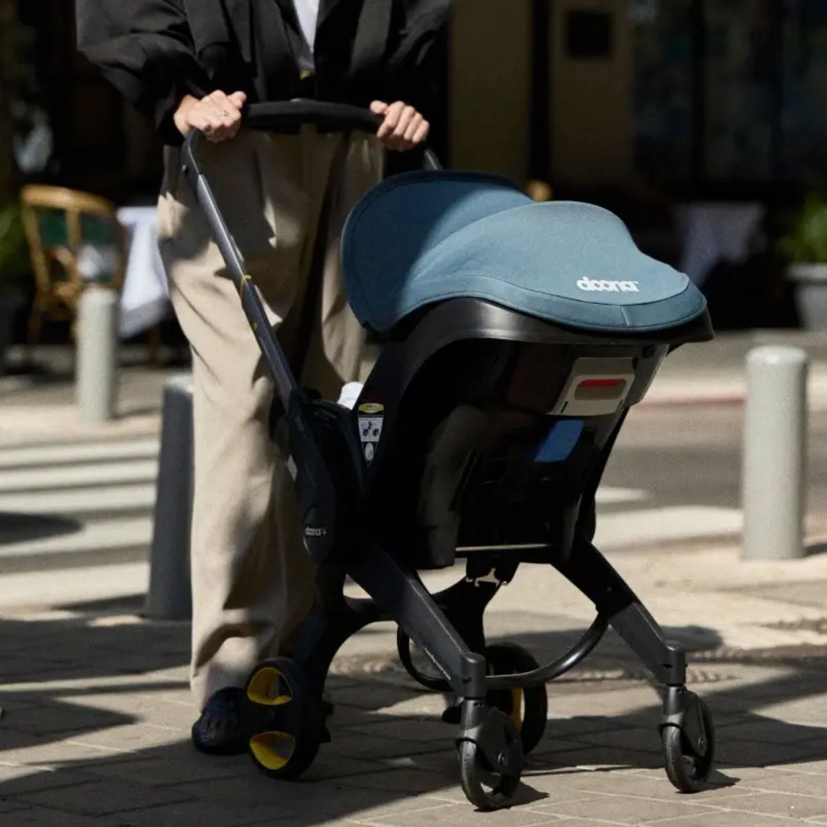 Doona Infant Car Seat & Stroller Travel System - Deep Blue - Perfect for Travel & Everyday Life